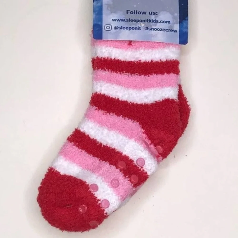Max and Olivia Kids plush socks with gripping soles.
